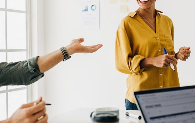 Woman in yellow shirt smiling